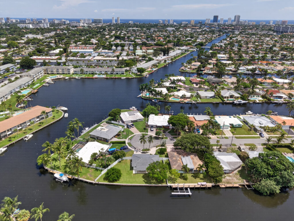 Aerial view along the canal to the Intracoastal Waterway and the coastline